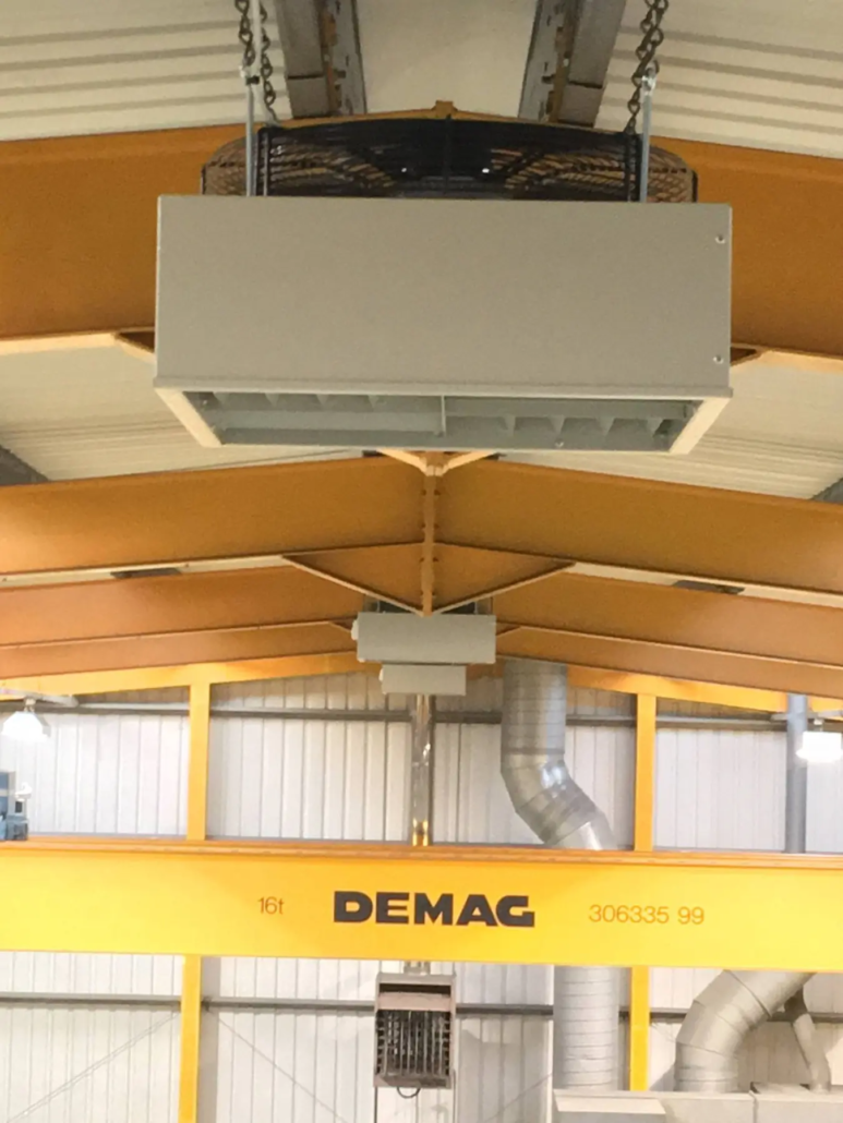 A de-stratification fan installed high in a factory roof in Ipswich